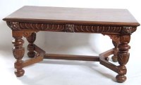 Lot 706 - Heavily carved Oak centre table