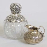 Lot 204 - Silver mounted cut glass scent bottle; small