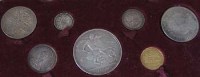 Lot 219 - Cased part 1887 coin set including gold half