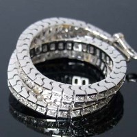 Lot 248 - 18ct white gold line bracelet, approximately