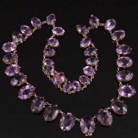 Lot 261 - Fifteen Carat Gold & Amethyst Fringe Necklace.