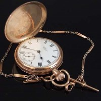 Lot 349 - Waltham nine carat gold watch and a chain monogrammed for William Watson.