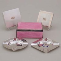 Lot 242 - Enamel cigarette box; two ashtrays; two cases