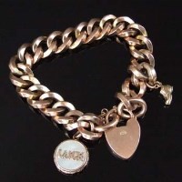 Lot 284 - 9ct gold flat curb bracelet with square section