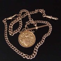 Lot 303 - Nine carat gold Albert chain with medal 28.7g