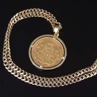 Lot 307 - Gold German 20 mark coin, 1913, in gold mount on