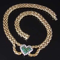 Lot 316 - Eighteen carat gold emerald and diamond snake