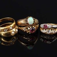 Lot 334 - Six gold costume rings.