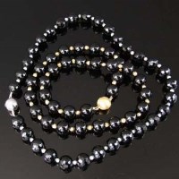 Lot 343 - Two onyx bead necklaces