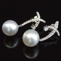 Lot 364 - 11.5mm south seas pearl earrings