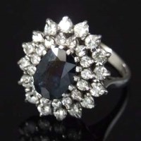 Lot 372 - 18ct white gold sapphire and diamond ring.