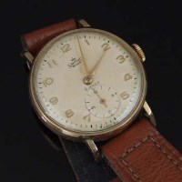 Lot 404 - Smiths gold wristwatch.