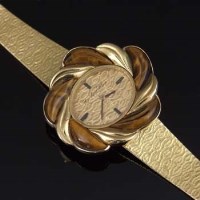 Lot 406 - Yves Saint Blaise eighteen carat gold watch.