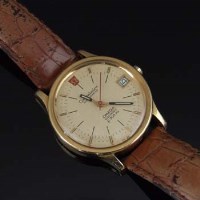 Lot 420 - Omega constellation electronic f 300HZ watch in gold case on leather strap