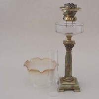 Lot 448 - Onyx and brass oil lamp.