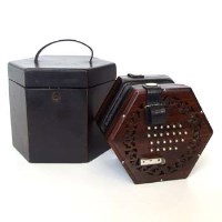 Lot 449 - Rosewood forty-eight key concertina with case