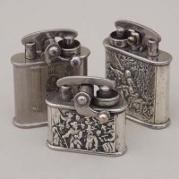 Lot 453 - Three Colibri cigarette lighters two with .800