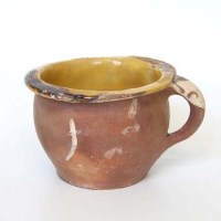 Lot 531 - 17th century West country chamber pot.