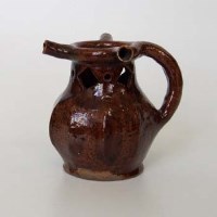 Lot 540 - Late 18th century Midlands earthen ware puzzle