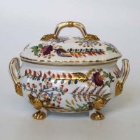 Lot 559 - Derby lidded tureen supported on animal paw feet.