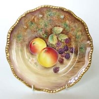 Lot 578 - Royal Worcester black mark small plate