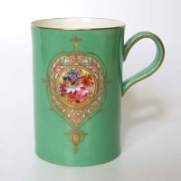Lot 588 - Royal Worcester green floral tankard.