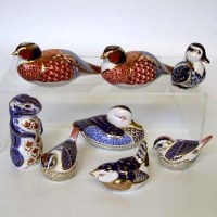 Lot 604 - Eight Royal Crown Derby paperweights