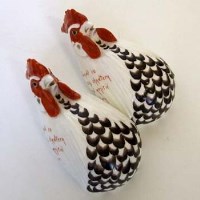 Lot 619 - Pair of Royal Worcester string holders DB570