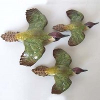 Lot 637 - Set of three Beswick wall birds.