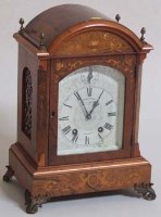 Lot 650 - Inlaid bracket clock.