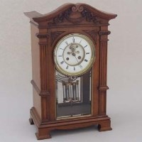 Lot 652 - Oak bracket clock with mercury pendulum.