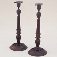 Lot 669 - Pair turned and reeded candlesticks.