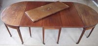 Lot 688 - George III mahogany D dining table with centre.