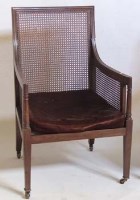 Lot 692 - Mahogany caned arm chair.