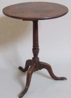 Lot 701 - Oak tripod table.