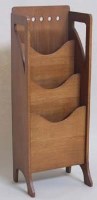 Lot 704 - Oak Edwardian magazine rack.