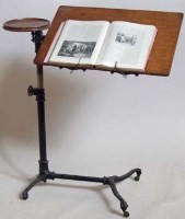 Lot 719 - Iron and oak bed table.