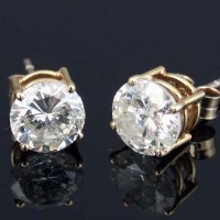 Lot 255 - Pair of single stone diamond ear studs