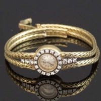 Lot 313 - Omega cocktail wristwatch on 18ct gold and
