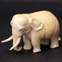 Lot 396 - Carved ivory elephant