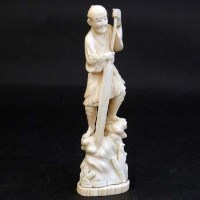 Lot 397 - Japanese ivory okimono of a boatman with paddle (faults)