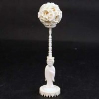 Lot 399 - Small ivory puzzle ball on stand