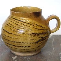 Lot 411 - Staffordshire Slipware Honey Pot c1700