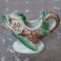 Lot 430 - Staffordshire sauceboat DB3512
