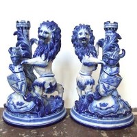 Lot 466 - Pair of St Clemont tin glazed lions DB4140