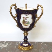 Lot 508 - Coalport Three Handled Vase