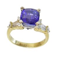 Lot 71 - Tanzanite single stone 18ct yellow gold ring with diamond set shoulders