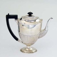 Lot 204 - Silver half reeded hot water jug.
