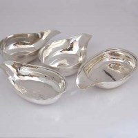 Lot 223 - Four silver papboats with plain rims