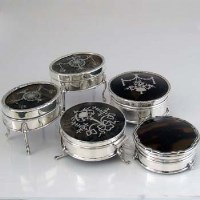 Lot 228 - Five tortoiseshell and silver boxes